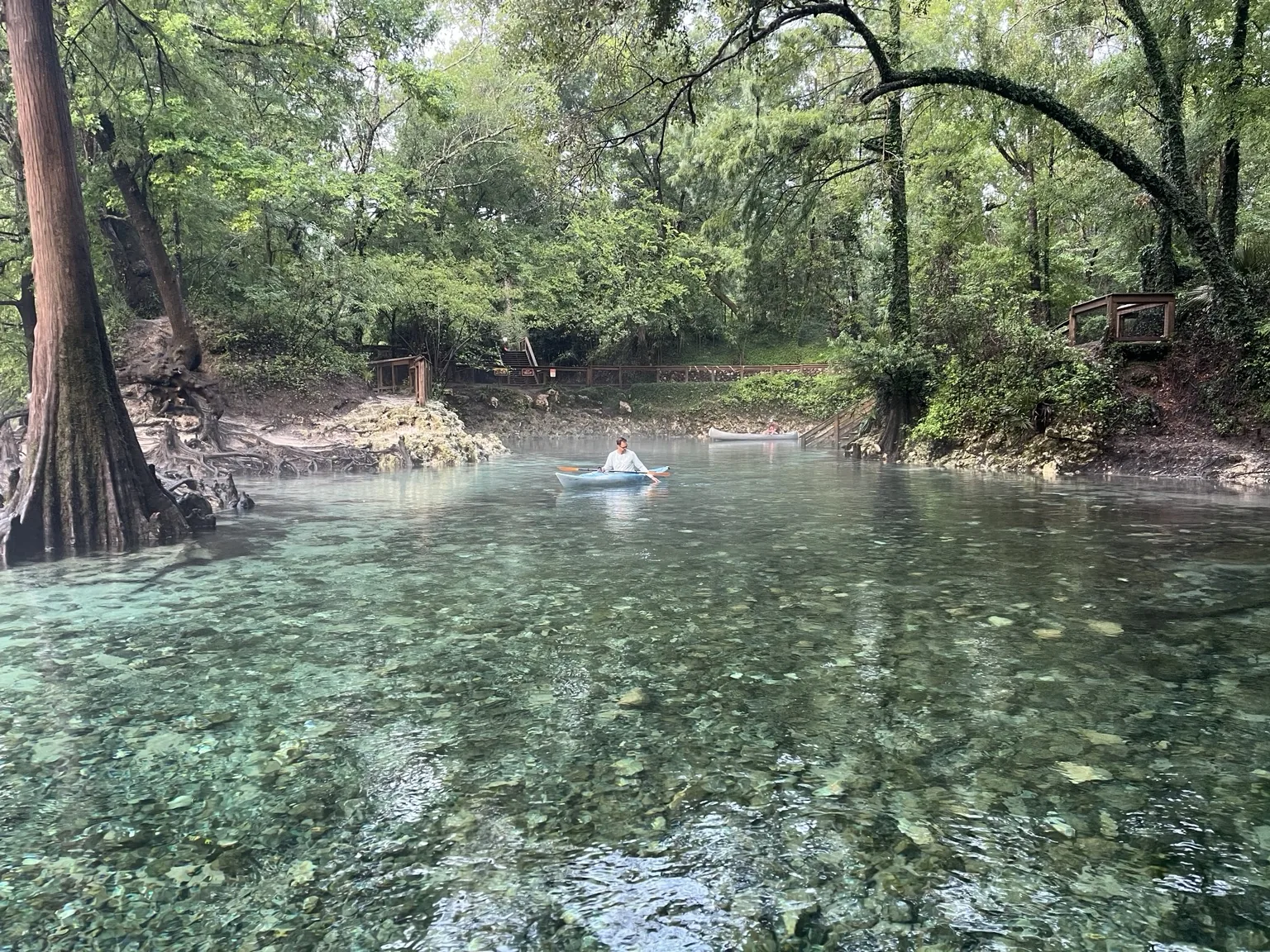 Kayak paddler on clear turquoise water at Madison Blue Spring on the Withlacoochee River
